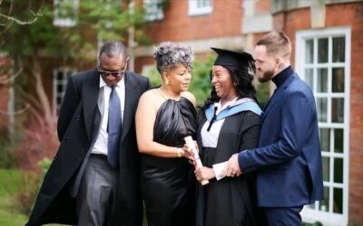 DJ Cuppy Poses with Parents and fiancee