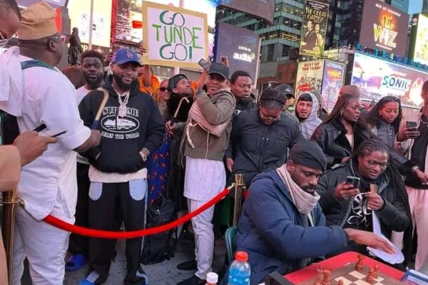Chess Master Tunde Onakoya Receives Davido's Support at Times Square